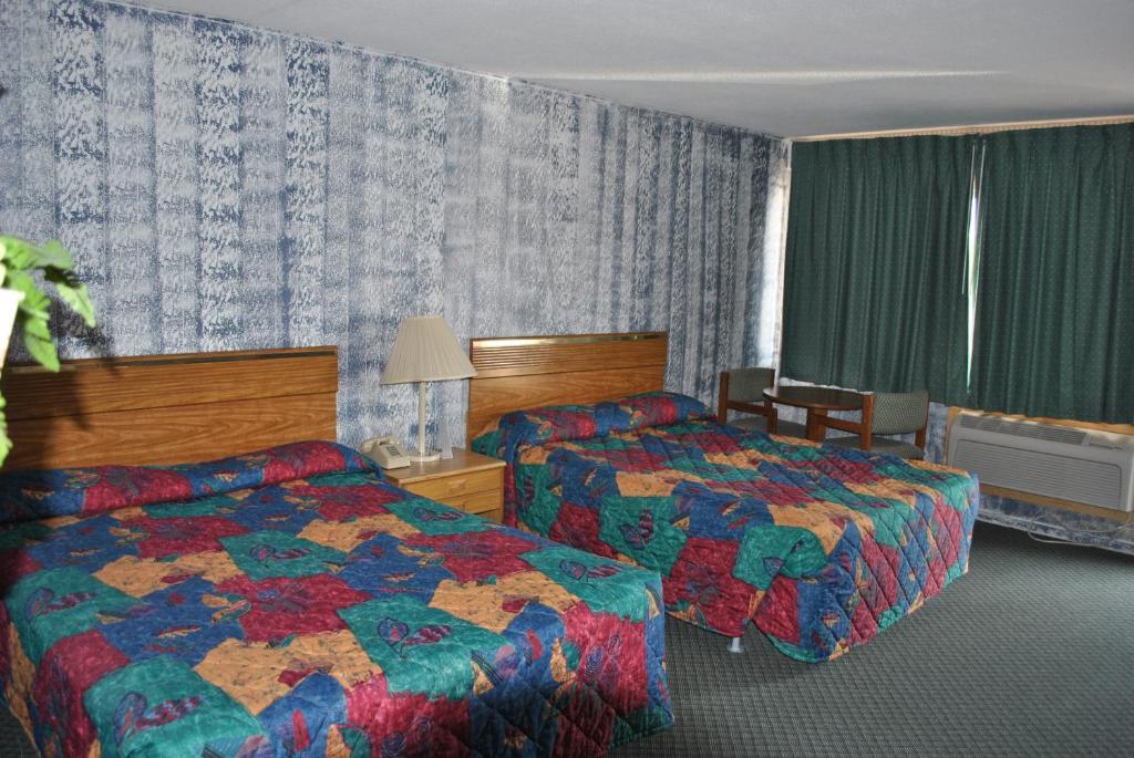 Travel Inn Motel Michigan Stadt Zimmer foto
